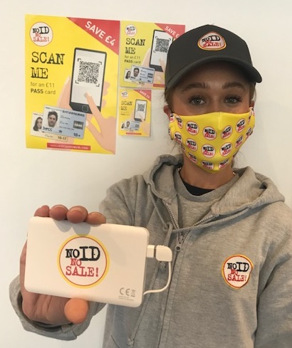 'No ID, No Sale!' face mask and power charger